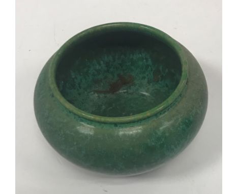 A Ruskin mottled green glazed vase of squat form stamped "Ruskin 1913" to base 9.5 cm high CONDITION REPORTS Very dirty insid