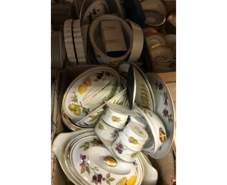 A collection of Royal Worcester "Evesham" and "Wild Harvest" oven to table wares including oven tureens, dishes, ramekins, et