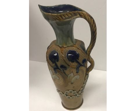 A Frank A. Butler Doulton Lambeth relief work decorated jug bearing monogram to base and No'd. “3069”, 42 cm high CONDITION R