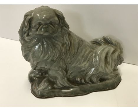 A Charles Vyse Chelsea pottery figure of a Pekingese, monochrome (for similar model see Terence Cartlidge Charles &amp; Nell 