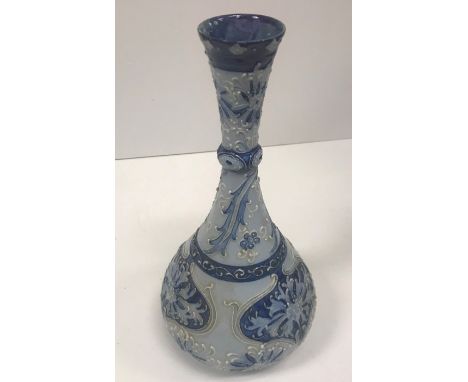 A Moorcroft MacIntyre florian ware vase with piped decoration with incised signature and inscribed "M.743" and bearing "Flori