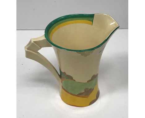 A Clarice Cliff “Bizarre Fantasque” design waisted jug decorated with coastal seascape with two cottages and smoke rising fro