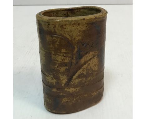 A St. Ives Pottery oval brown glazed vase by Bernard Leach with incised floral spray decoration, bearing initials "BL" 14 cm 