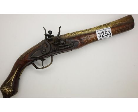 Heavy gauge replica brass inlaid flintlock pistol. P&amp;P Group 2 (£18+VAT for the first lot and £3+VAT for subsequent lots)
