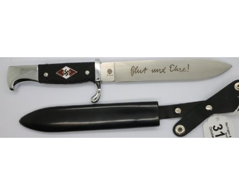 German Third Reich copy Hitler Youth dagger, with enamelled emblem set into the chequered grip, steel scabbard and engraved b