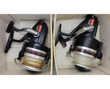 Two Daiwa J40 boxed fixed spool reels. P&amp;P Group 2 (£18+VAT for the first lot and £3+VAT for subsequent lots) 