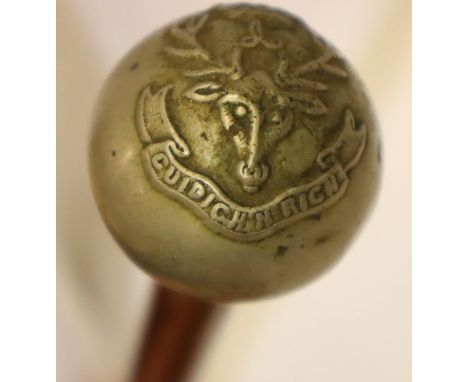 British WWI swagger stick, Highlanders, with white metal pommel. P&amp;P Group 2 (£18+VAT for the first lot and £3+VAT for su