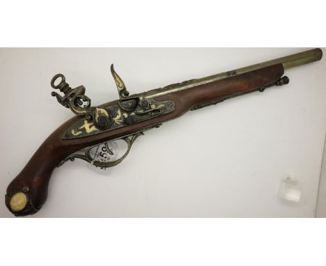 Replica flintlock pistol, the metalwork set with ivorine panels and cameos. P&amp;P Group 2 (£18+VAT for the first lot and £3