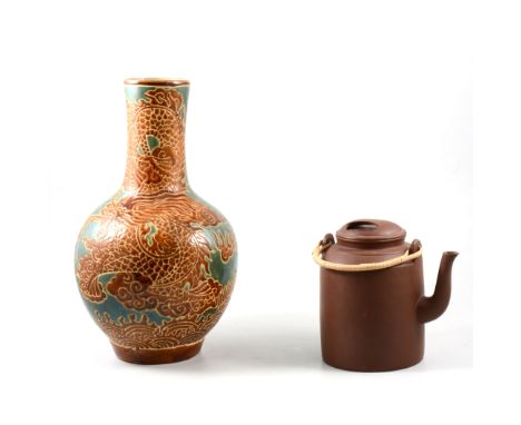 Japanese lead glaze stoneware bottle vase, incised decoration, a dragon, 34cm; and a Yixing type teapot. (2). 