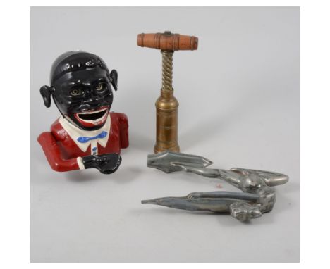 Brass corkscrew, fruitwood handle; cast iron money box; lantern, and a metal car mascot, for a Buick. (4)