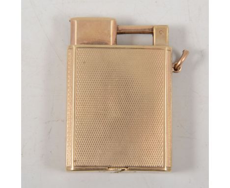 A 9 carat yellow gold "Everest" cigarette lighter, engine turned design, .50mm x 32mm, hallmarked London (imported), no date 