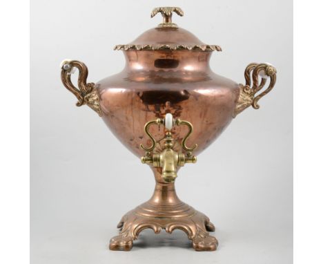 Large 19th Century copper and brass samovar, with scrolling mount and opal glass handles. 