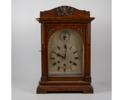 A Gustav Becker oak cased shelf clock, silvered dial with Roman numeral chapter ring, three train movement, number 2352829, p