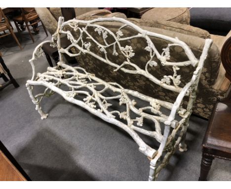 Coalbrookdale pattern cast iron bench, (repaired), length 135cm.