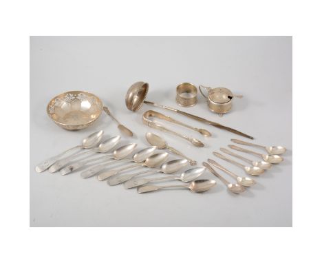 Pair of Scottish sugar nips, white metal toddy ladle, peared silver dish, napkin ring, mustard pot and other silver spoons. 