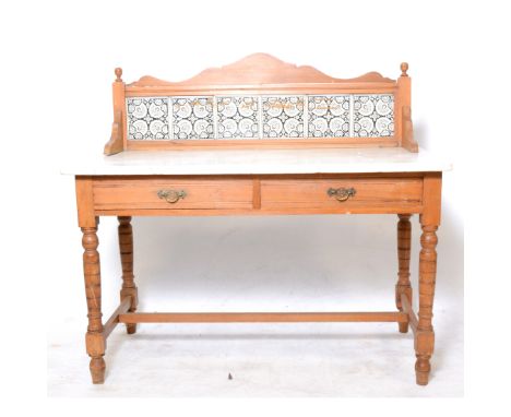 Victorian walnut washstand, marble top and tile back, width 108cm, depth 53cm, height 99cm.
