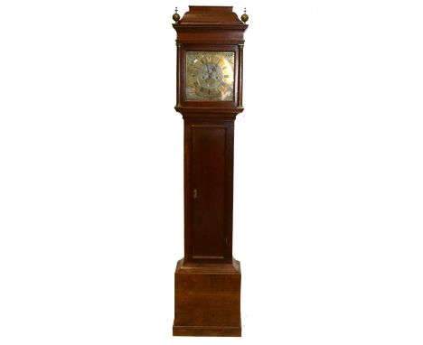 Oak longcase clock, cavetto moulded cornice below a pediment, brass finials, the hoot with three-quarter engaged columns, lon