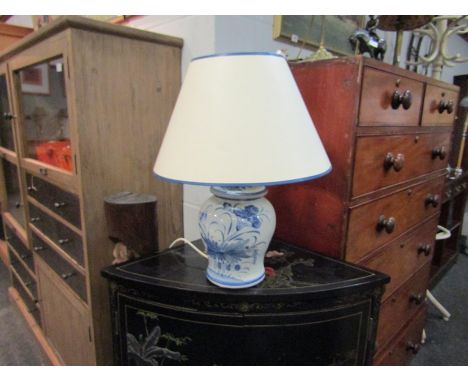 A modern ginger jar form blue and white table lamp base with shade