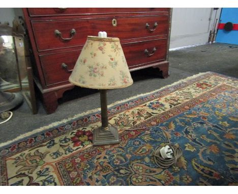 A brass Corinthian column form table lamp with floral shade 