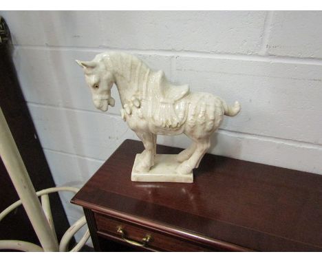 A Tang style ceramic horse, 34cm tall