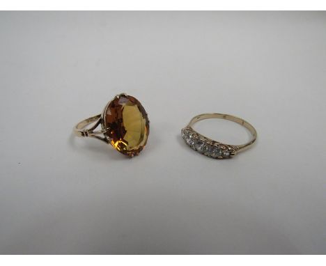 A lady's ring set with citrine and a ring marked 9K