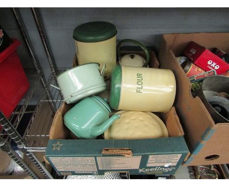 A box of tin and enamel wares