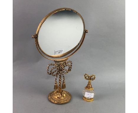 GILTMETAL TABLE MIRROR, 39cm high, along with an oval wall mirror, photograph frame, trinket box and perfume bottle (5)