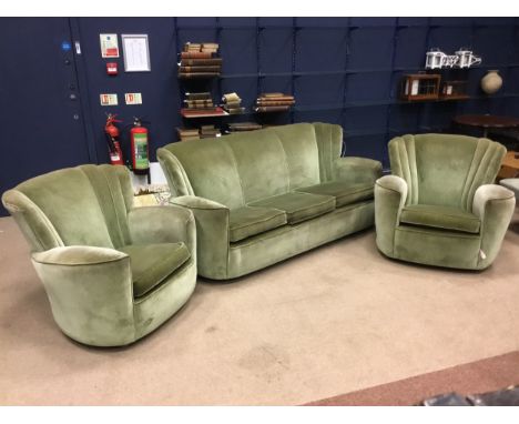 ART DECO THREE PIECE SUITE, comprising two armchairs and a three seater sofa, green upholstery, the three seater 195cm wide, 