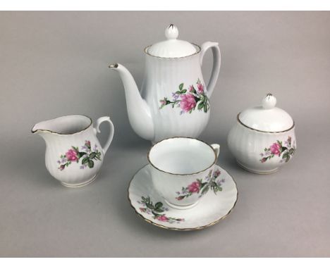 FLORAL AND GILT TEA SERVICE, along with another part tea service