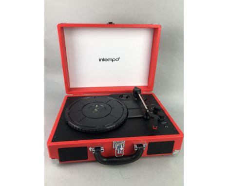 INTEMPO RECORD PLAYER, along with six coloured discs