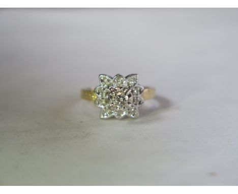 A yellow gold and white metal diamond cluster ring - size K, approx 4 grams - no hallmarks 