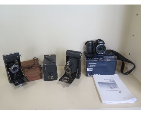 Two vintage bellows cameras, a box camera and a Panasonic DMCLZ20 digital camera 
