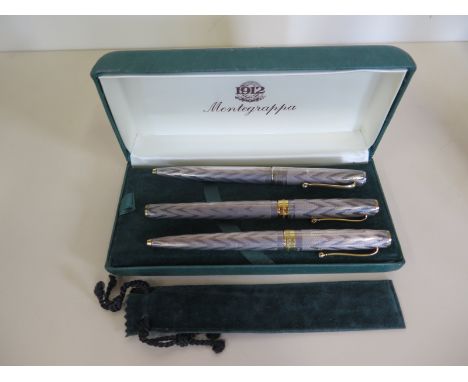 A Montegrappa 1055 VI 925 silver fountain pen and two 1055 VI ballpoint pens with box - ballpoints working, fountain pen not 