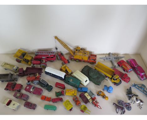 Approximately twenty vintage die cast model toys, including Dinky toys, Lesney and others, a Chivers trojan truck, Centurion 
