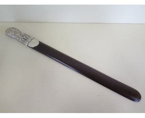 A hardwood page turner with Chinese silver embossed handle - 46cm long in clean condition 