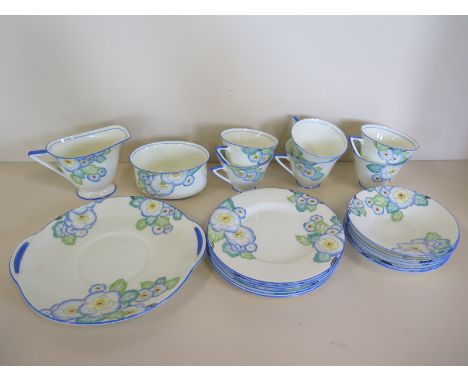 A part Royal Doulton Plaza tea service with six cups, six saucers, six tea plates, a twin handled serving dish, milk jug and 