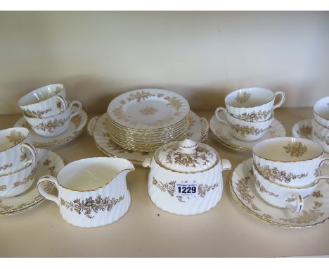A Minton tea service - 38 pieces - all generally good, apart from a repaired saucer 