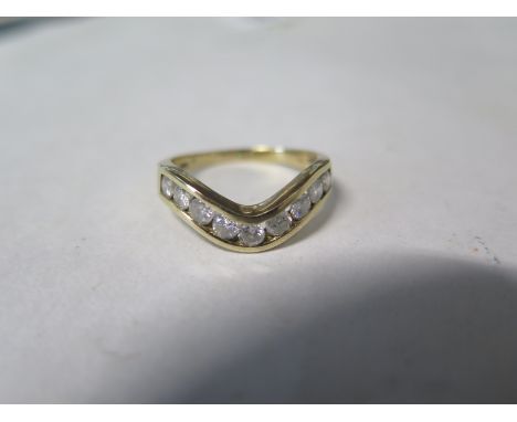 A 9ct yellow gold nine stone diamond ring, size S/T approx 3.6 grams, generally good, some minor usage - 15mm wide 