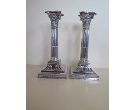 A pair of weighted silver candlesticks, 22cm tall, Sheffield 1899/1900, JD&S generally good some denting 