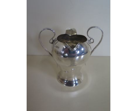 A silver double sauce boat, 3.5 troy oz, 10cm tall, Sheffield 1899/1900 maker JR clean condition, crest engraving 