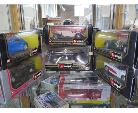 Six Burago diecast model sports cars, including a 1961 style Porsche 356B Cabriolet and a 1957 style Chevrolet Corvette, with