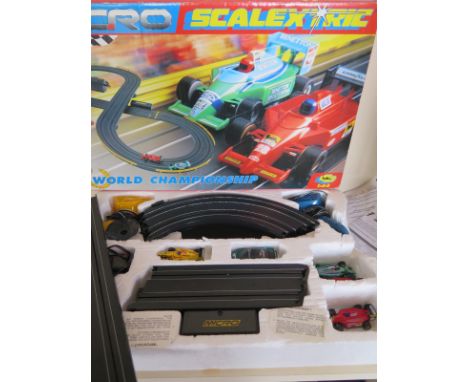 A Scalextric Micro world Championship set with five cars 