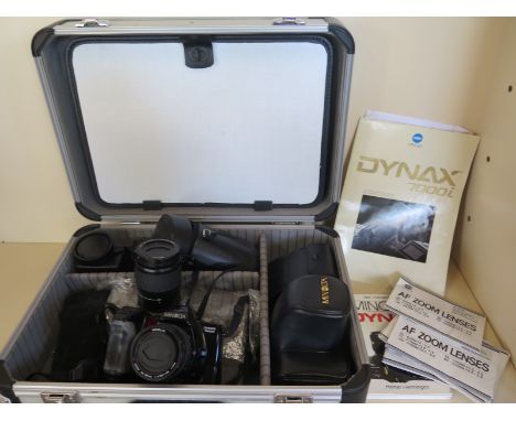 A Minolta Dynax 7000i camera with flash and two zoom lenses and hard case 