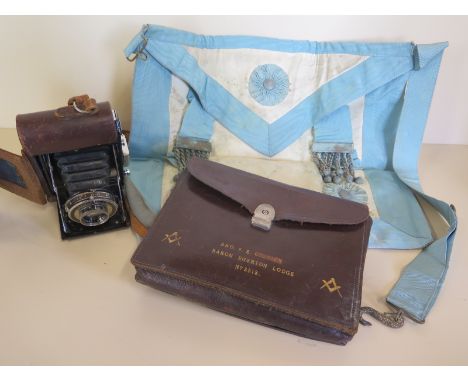 A cased Masonic apron from the Baron Everton Lodge together with a Zeiss Ikon camera with leather case, both items in a condi