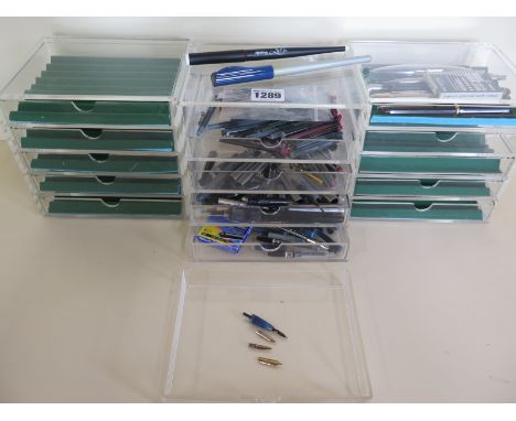 A collection of Fountain pen accessories and spare parts, including three 14 carat gold nibs approximately 1g, some roller ba