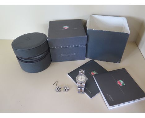 A ladies Tag Heuer professional stainless steel model 2000 quartz watch - 31mm wide including button, with box and links, cle