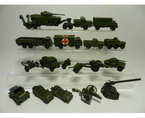 Eighteen unboxed Dinky Army vehicles dating from the 1950s suitable for spares or renovation, items include a tank transporte