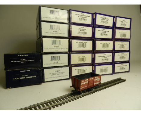 Twenty three boxed goods wagons by Dapol (15) and Bachmann (8) to include 4,5,7,8 and 9 plank wagons, Bachmann include tank w