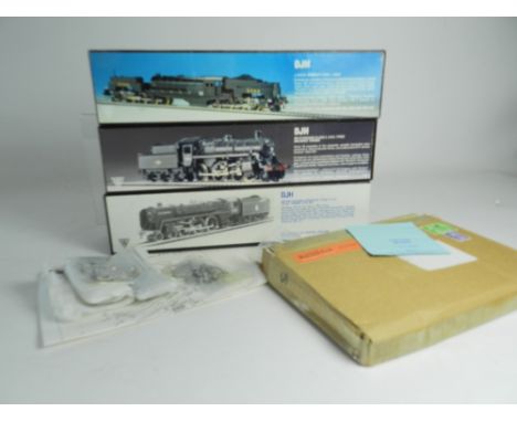 A group of three DJH model kits (unbuilt), a B.R. Standard Class 'Class' 4-6-2 loco, a B.R. Standard Class 3 2-6-0 loco and a
