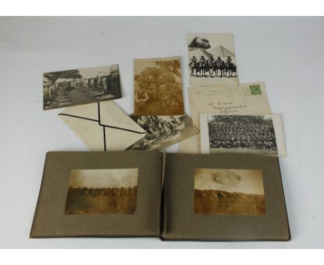 A First World War photograph album, taken in Egypt or Gallipoli, including military photographic postcards, two 'In Loving Me